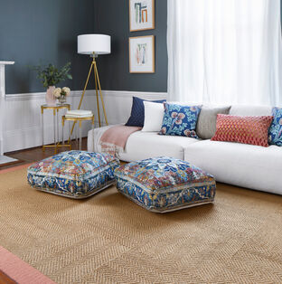 FLOR Signature Rug Suit Yourself Quarter Border shown in Raffia with a quarter cut border of Made You Look in Coral